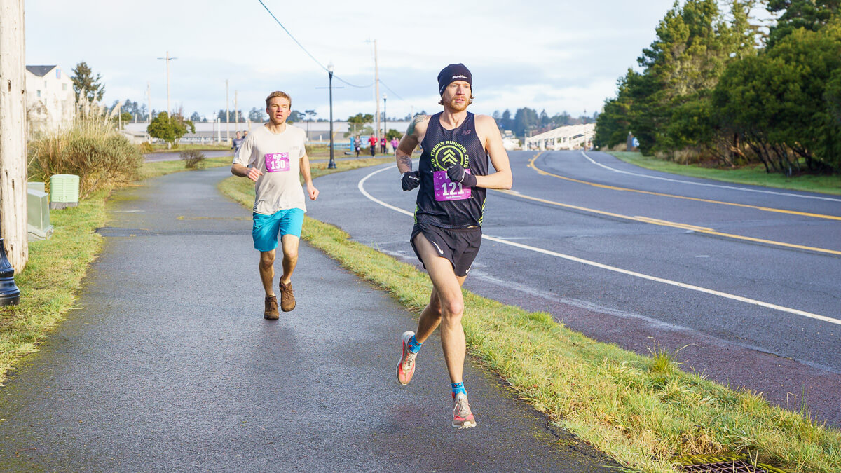 Family runners bonding during the race.