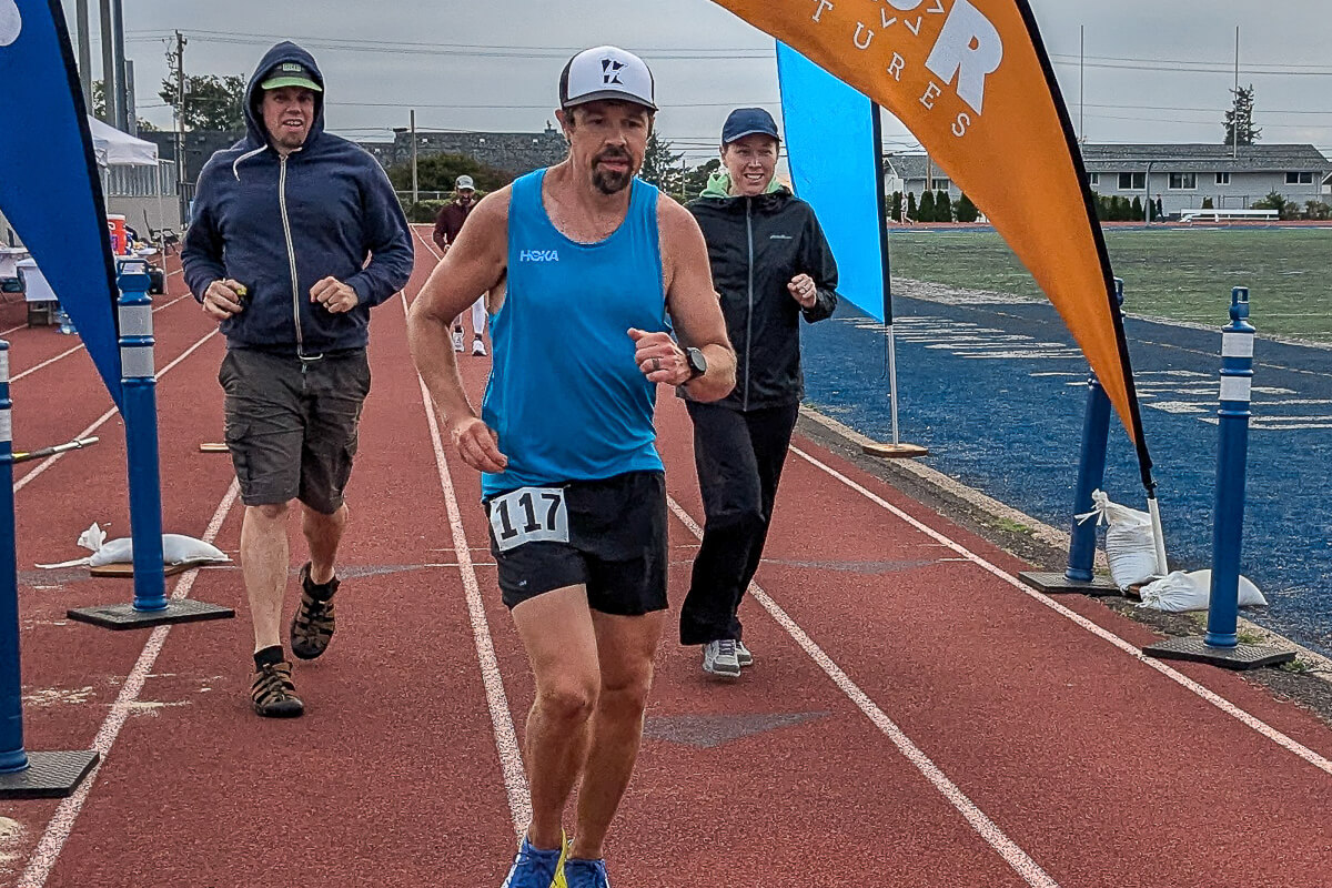 Runner pushing limits on track during night