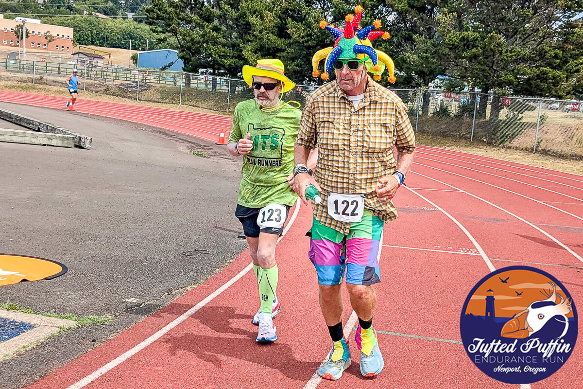 Runner racing on track at Tufted Puffin